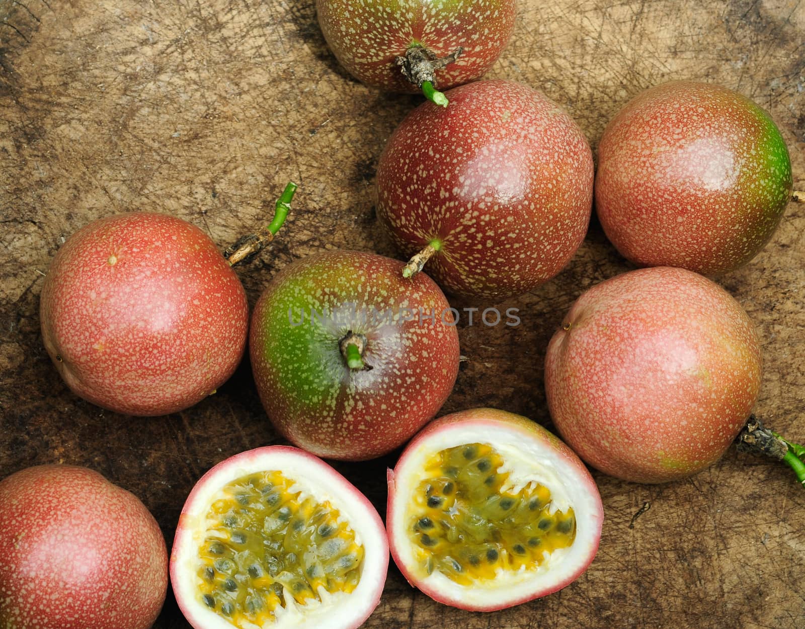Passion fruit on old wooden table.