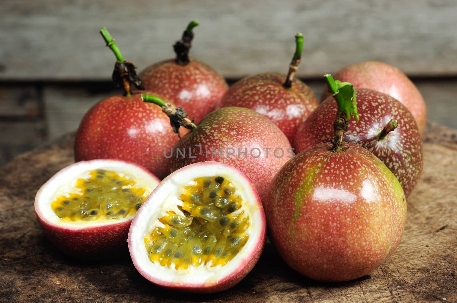 Passion fruit on old wooden table.