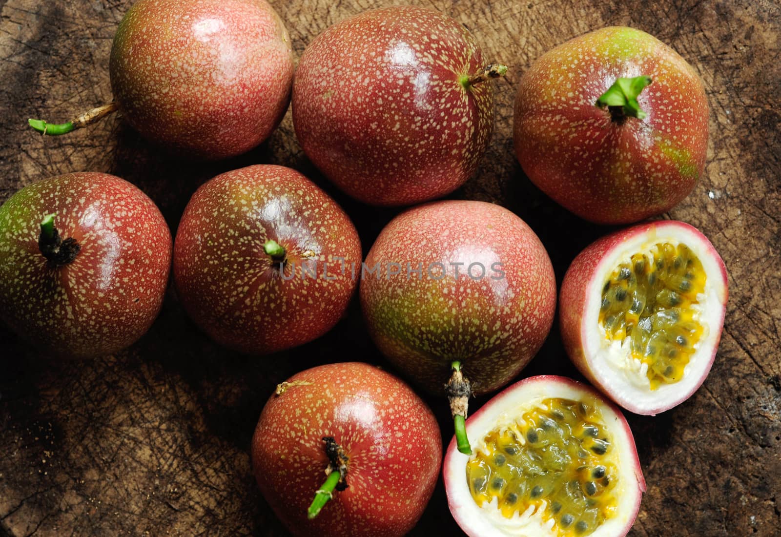 Passion fruit on old wooden table.