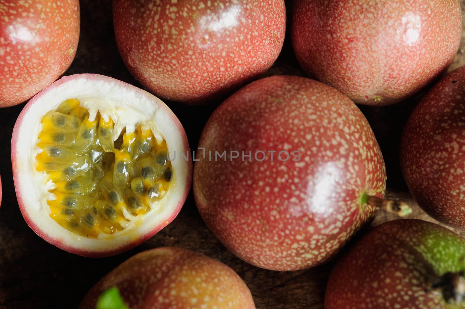 Passion fruit on old wooden table.
