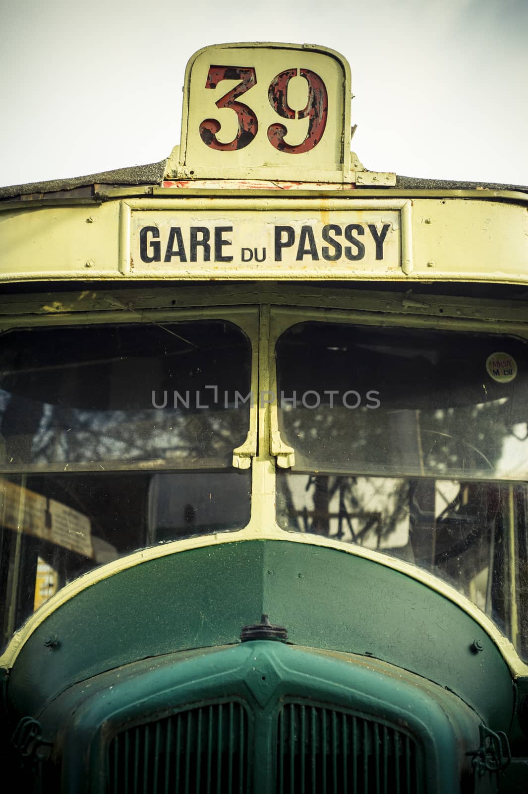 old Parisian tram with tourist destinations in Paris