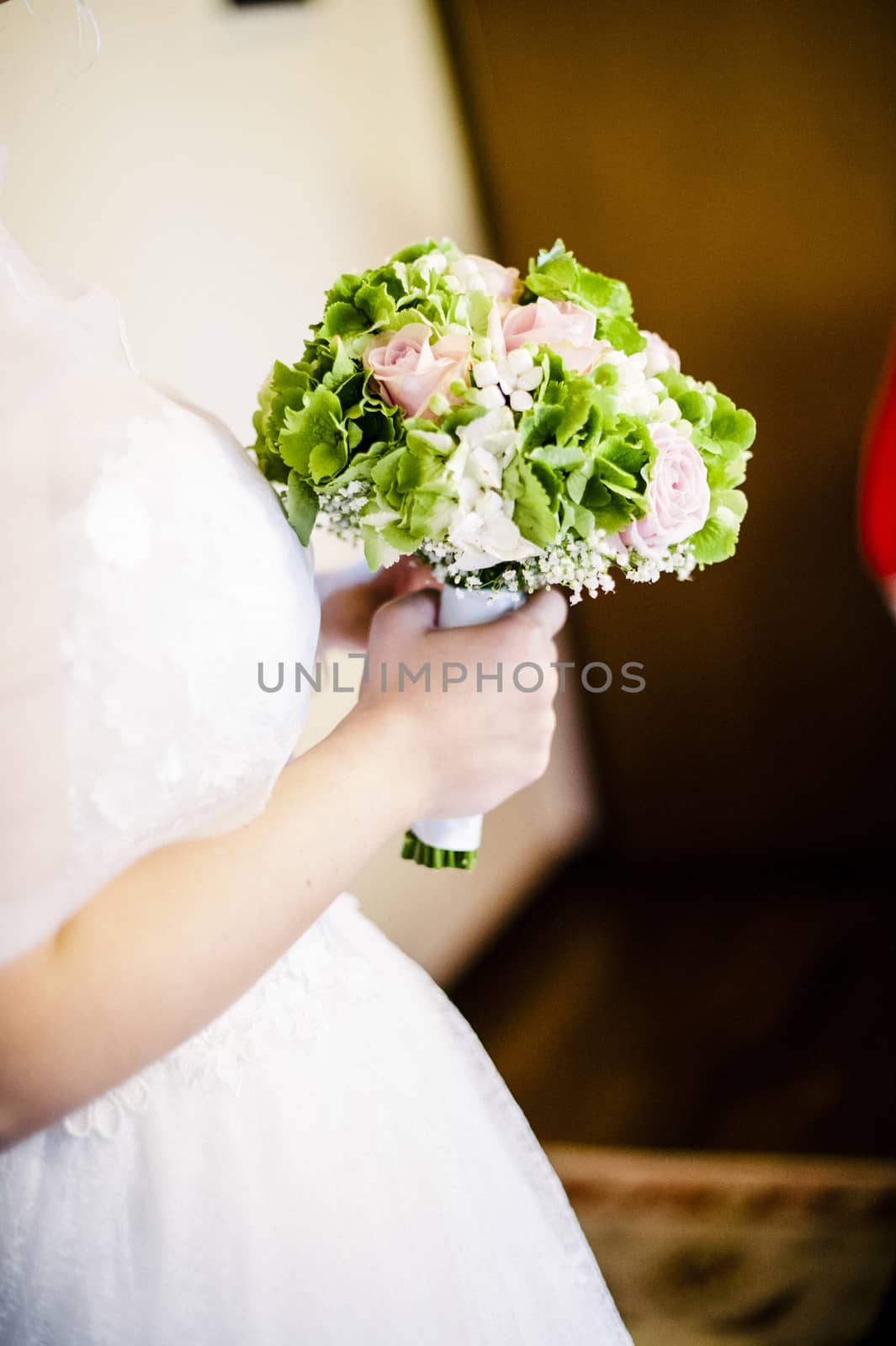 bridal bouquet with white and pink and green flowers, hydrangeas, roses