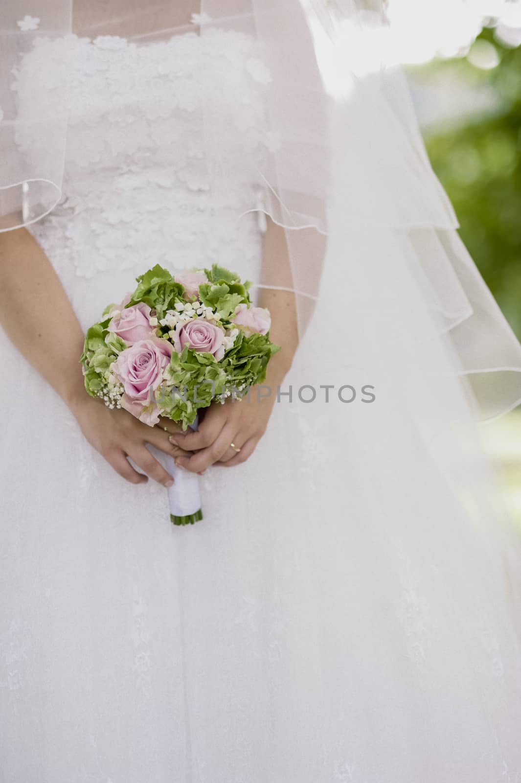 bridal bouquet with white and pink and green flowers, hydrangeas, roses