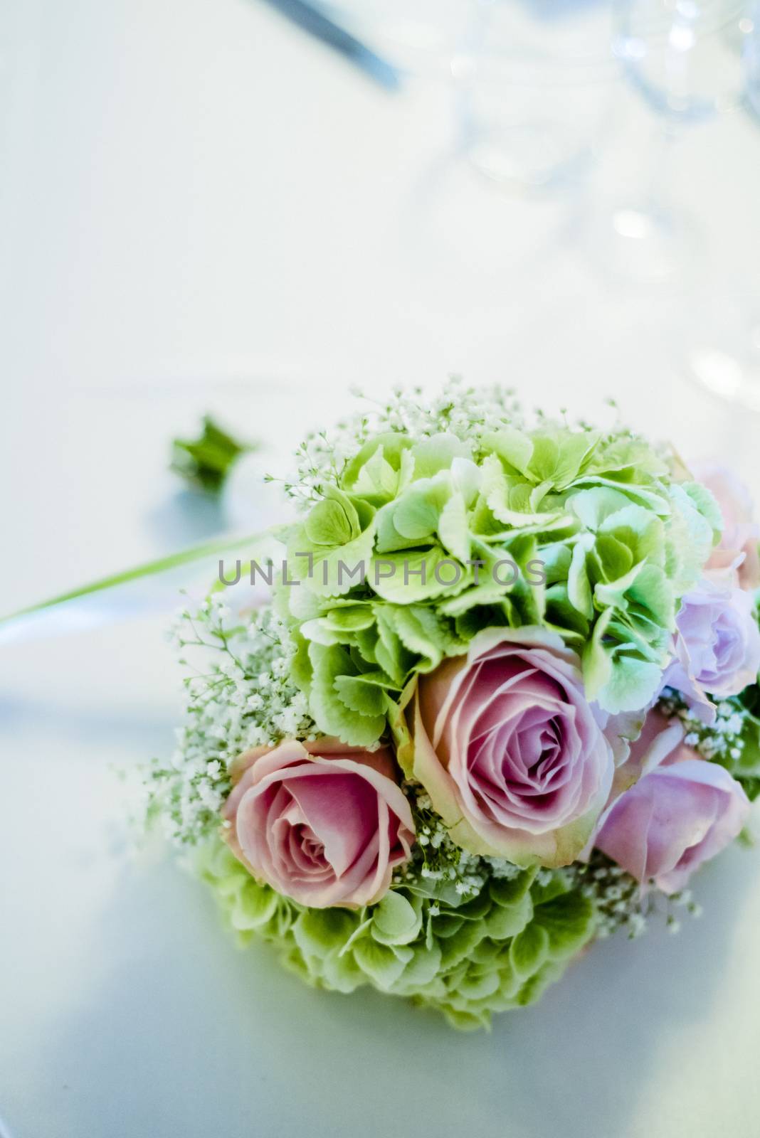 bridal bouquet with white and pink and green flowers, hydrangeas, roses