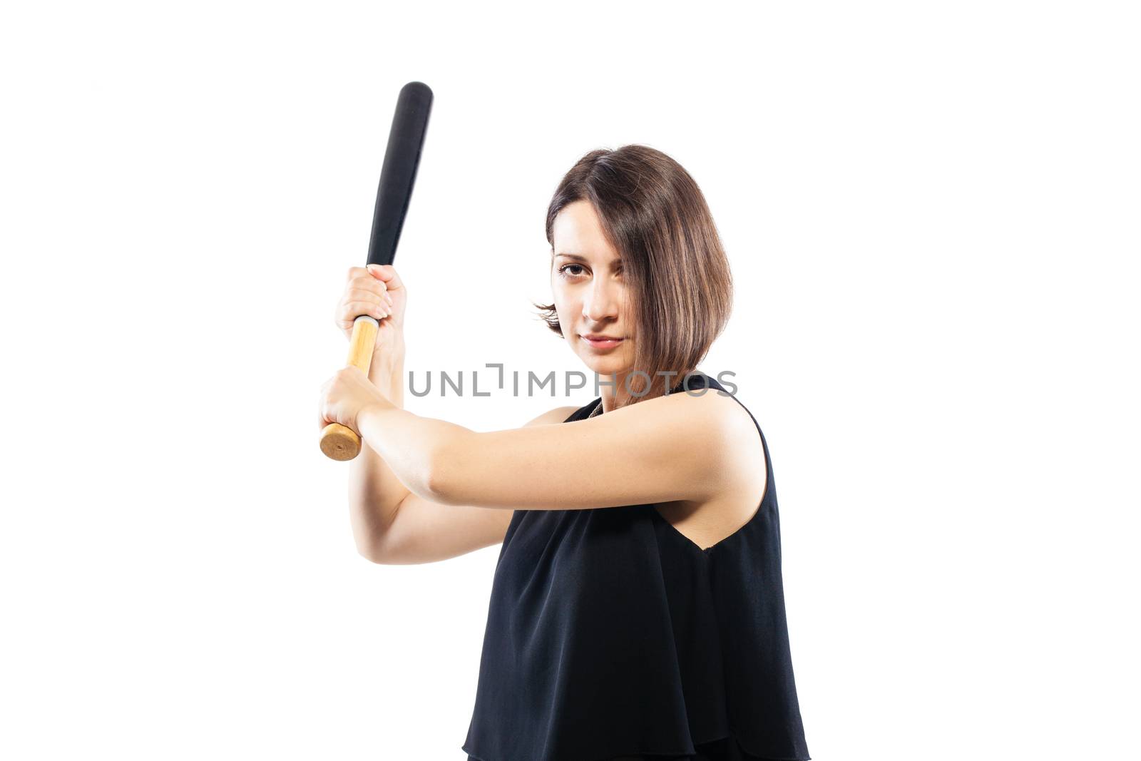 girl in camouflage pants holding a baseball bat, isolated on white