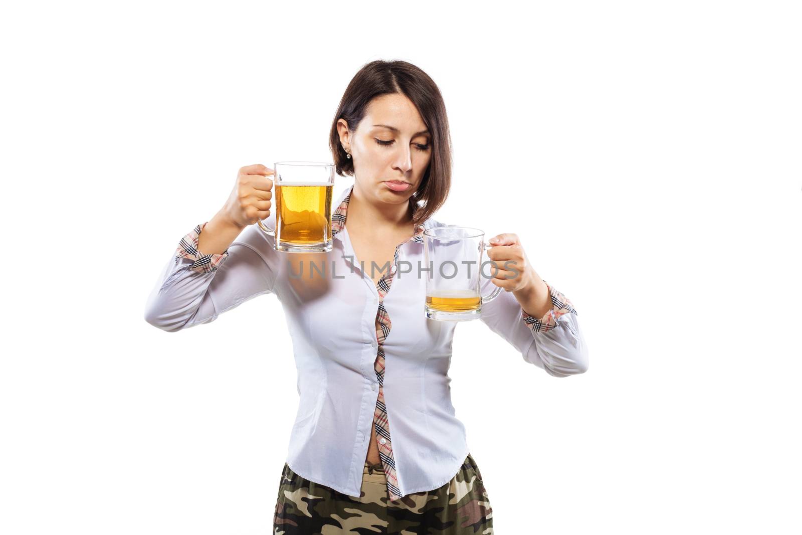 business girl holding two beer glasses against white background