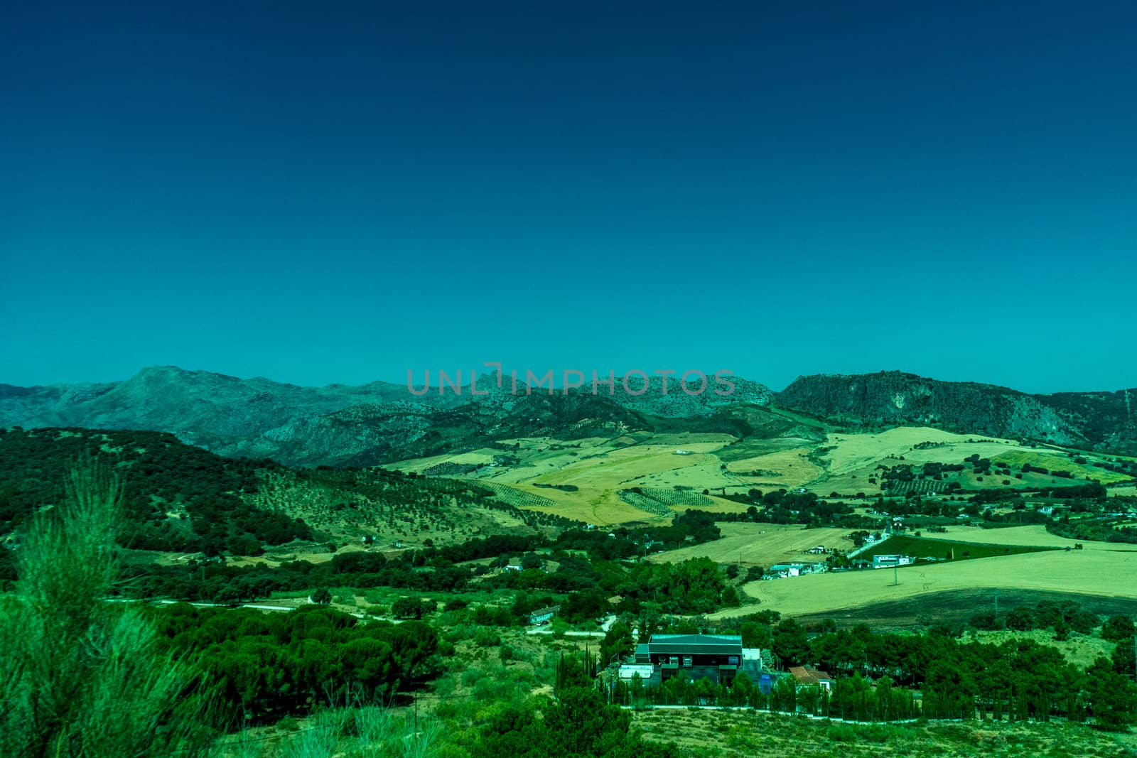 Greenery, Mountains, Farms and Fields on the outskirts of Ronda  by ramana16