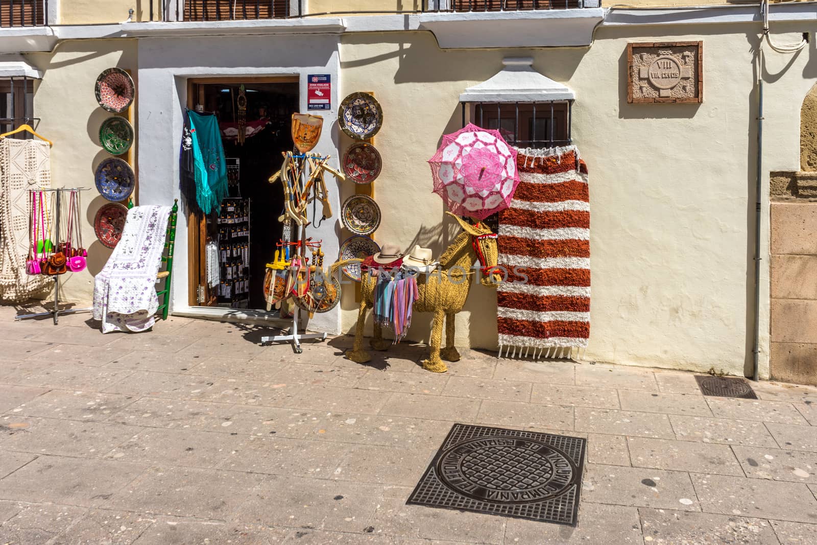 A streetside shop in the city of Ronda Spain, Europe on a hot summer day