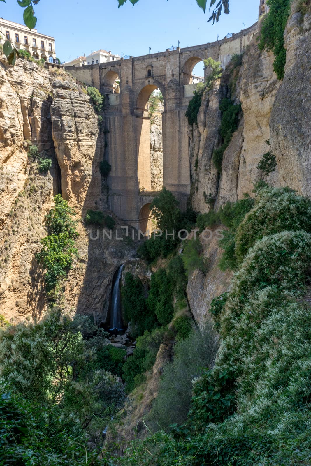 A gorge in the city of Ronda Spain, Europe on a hot summer day by ramana16