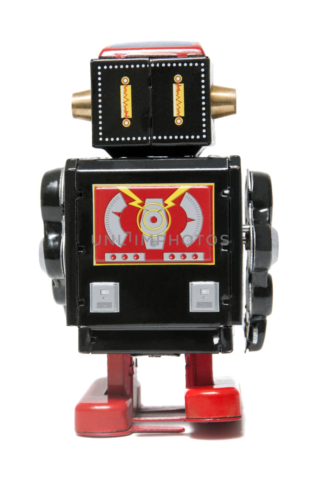 Vintage tin robot toy isolated on a white background.