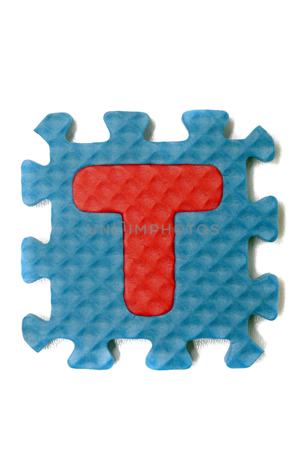 Foam puzzle letter uppercase isolated on a white background.