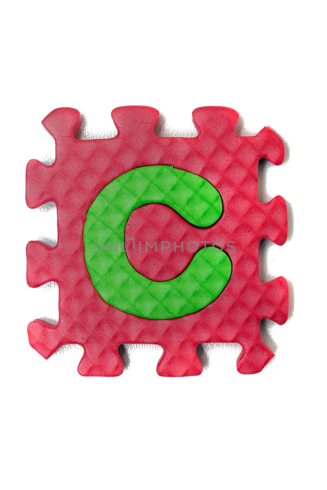 Foam puzzle letter uppercase isolated on a white background.