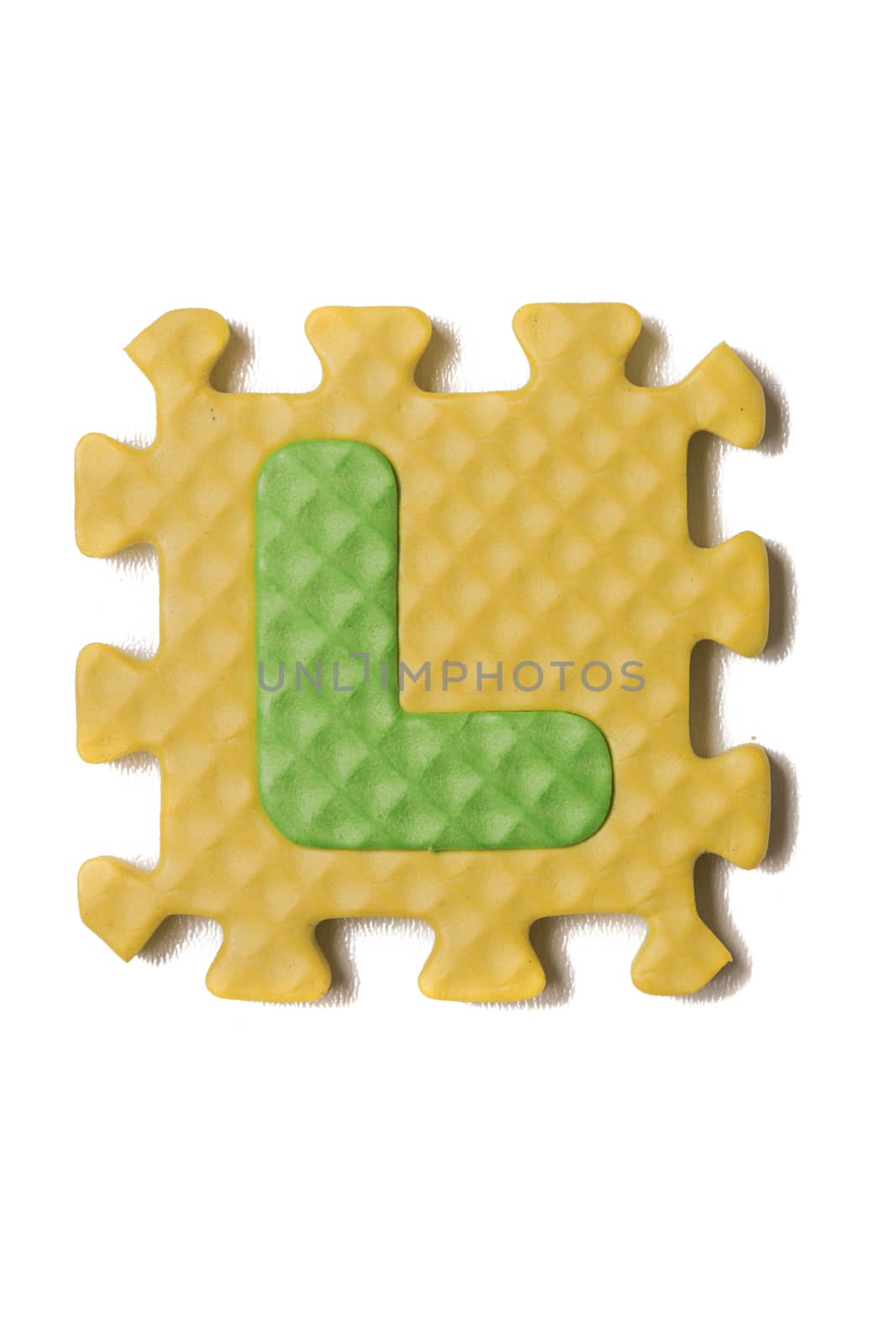 Foam puzzle letter uppercase isolated on a white background.