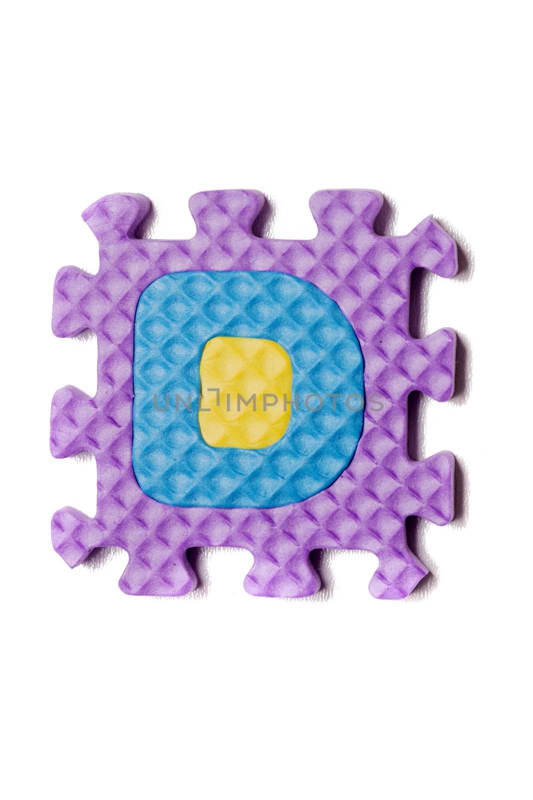 Foam puzzle letter uppercase isolated on a white background.