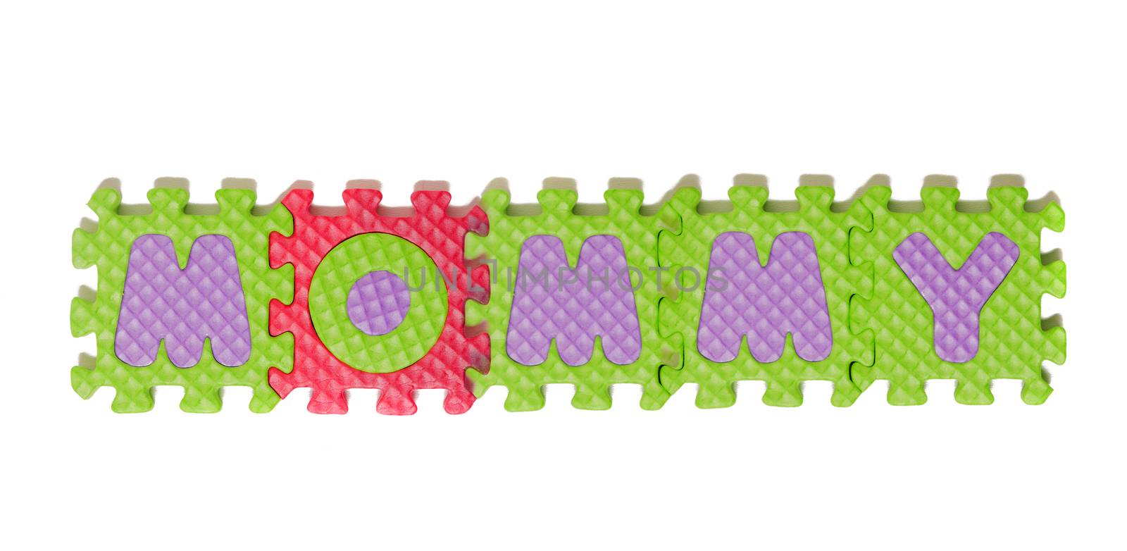 Foam puzzle letter uppercase with word Mommy isolated on a white background.