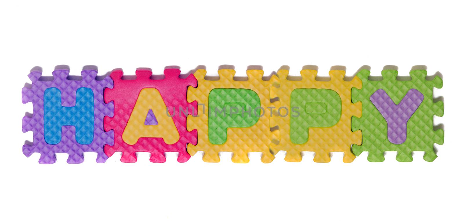Foam puzzle letter uppercase with word Happy isolated on a white background.