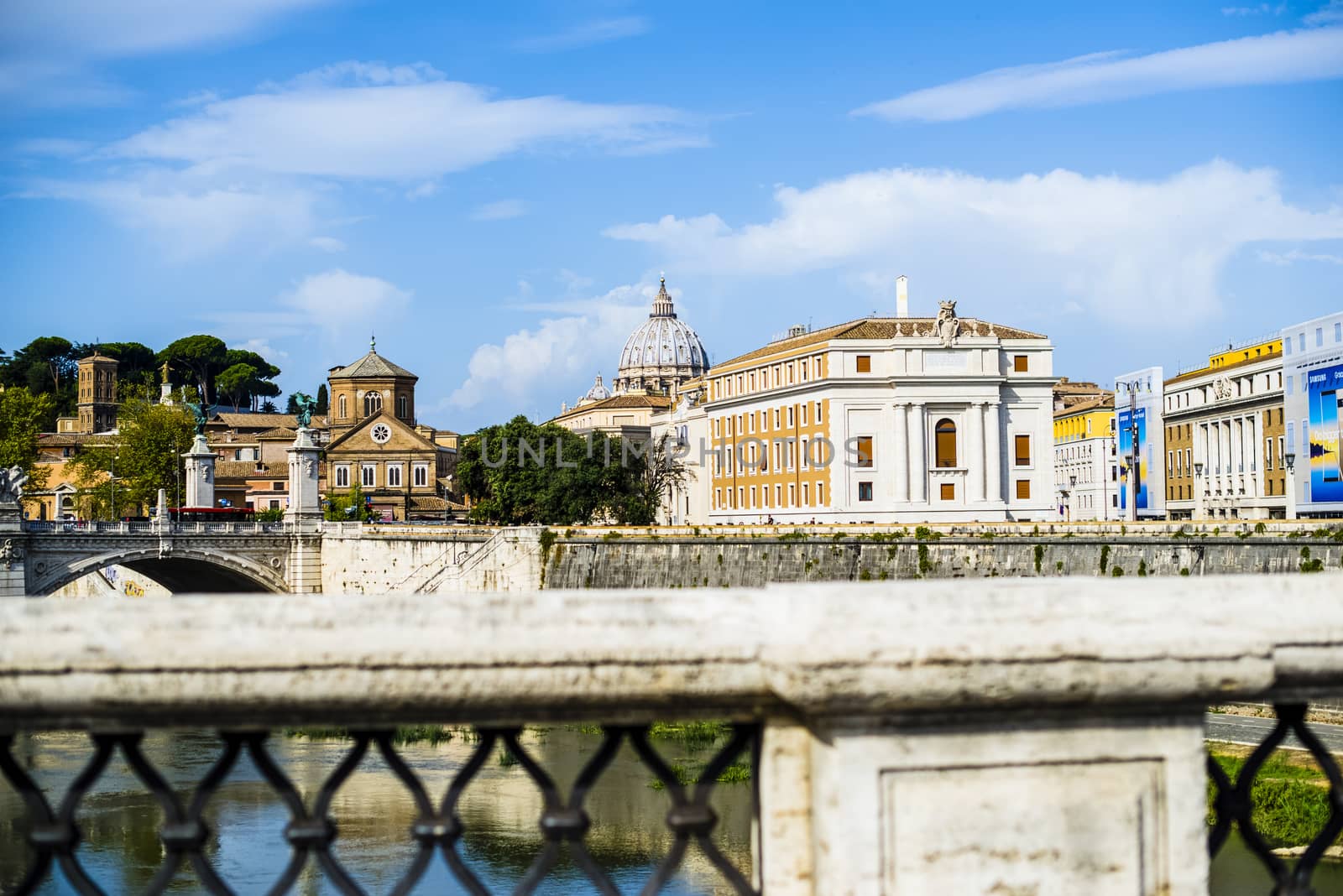 Italy, Rome, City of the Vatican dome of San Pietro seen from the bridge over the Tiber River