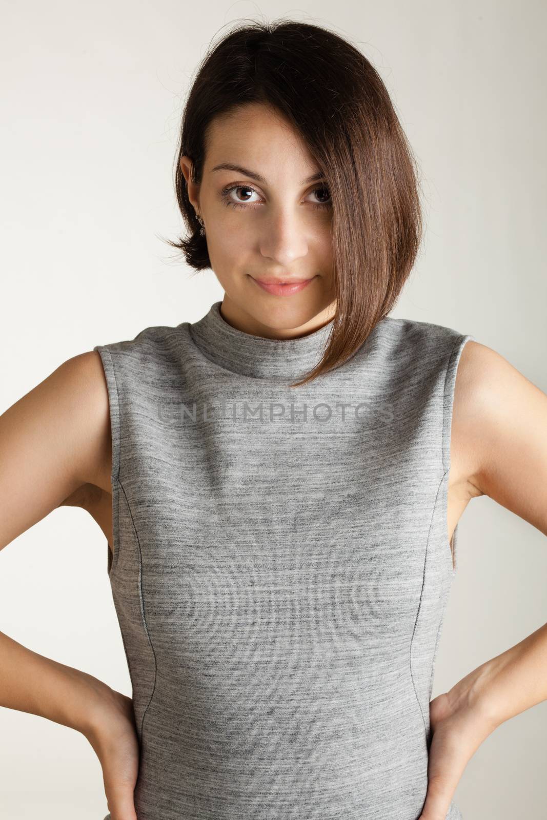 portrait of a beautiful girl with short hair wearing a dress