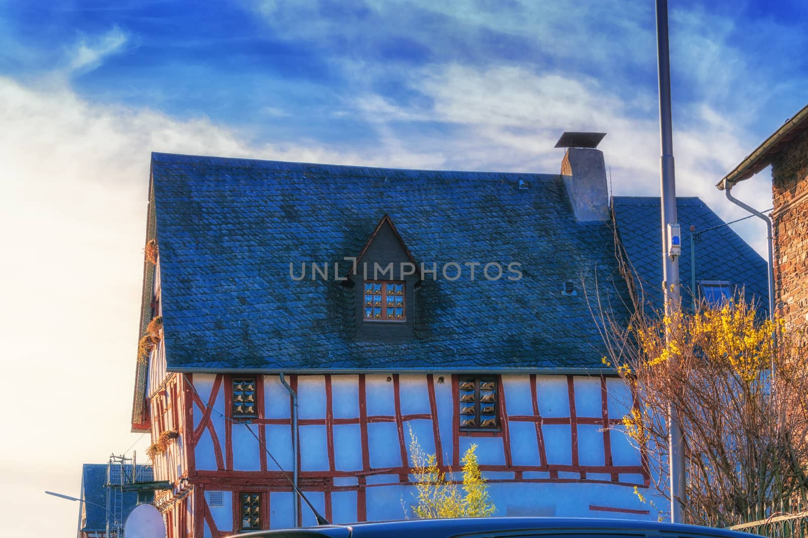 Historic half-timbered house "Zum Eichamt" in Zell Mosell directly on the Moselle promenade,