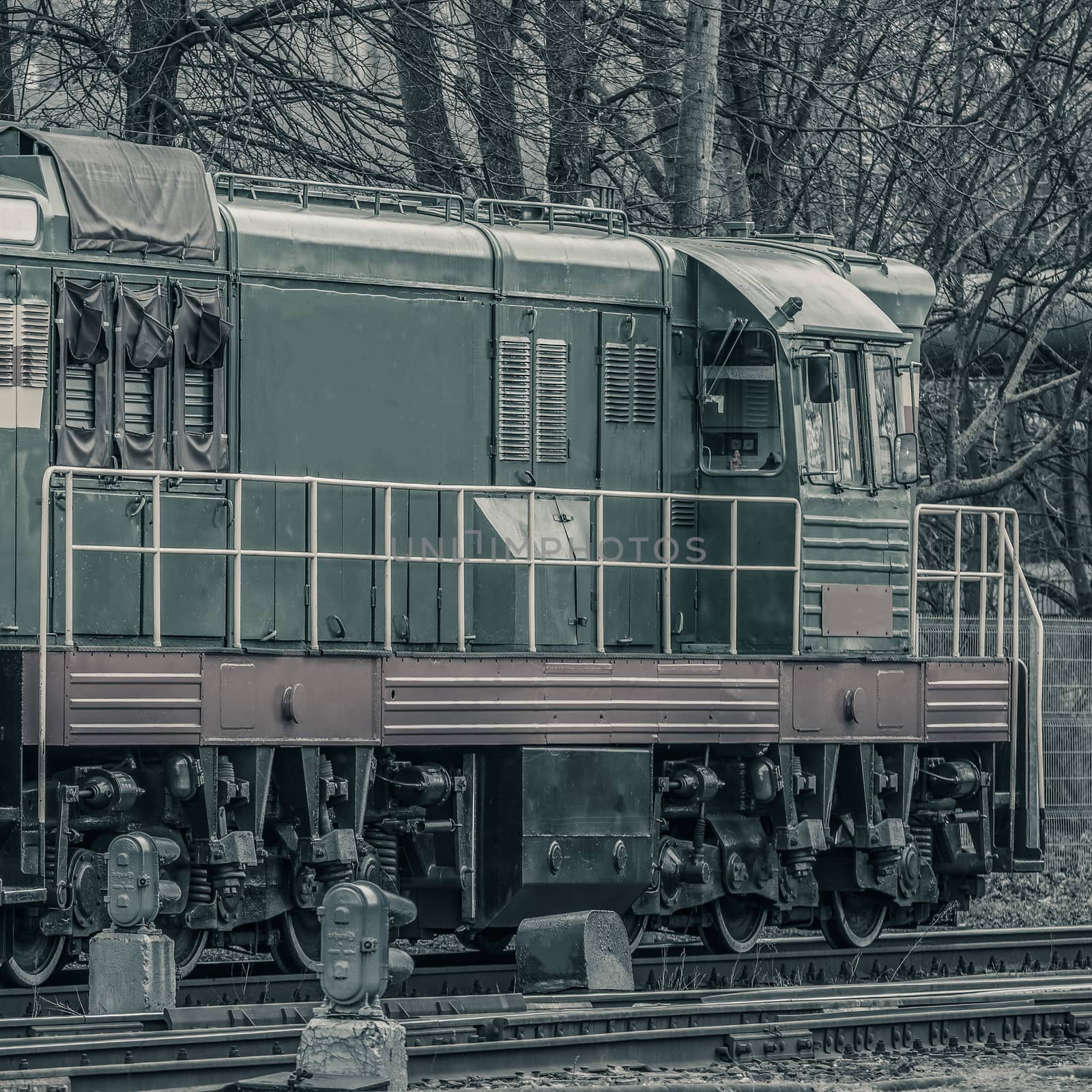 Old diesel cargo locomotive. Freight train in action