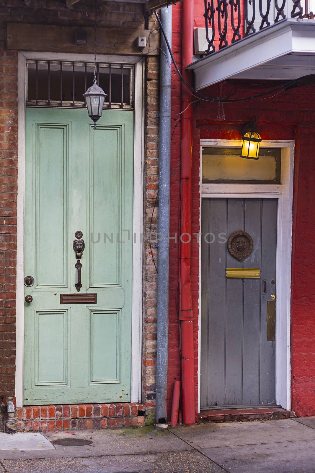 two old wood door from two different building from the french quarter in New Orleans