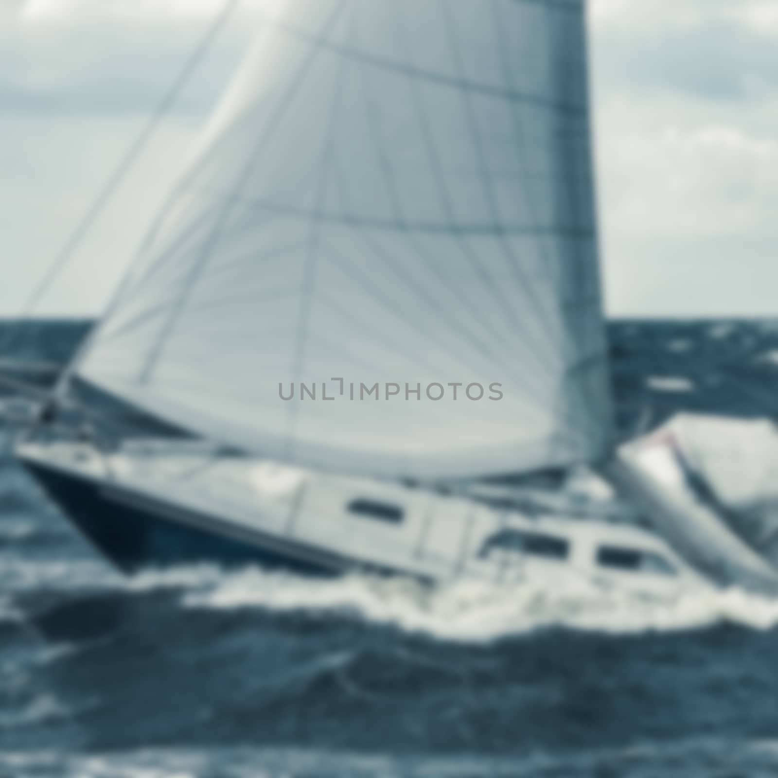 Blue sailboat - blurred image by sengnsp