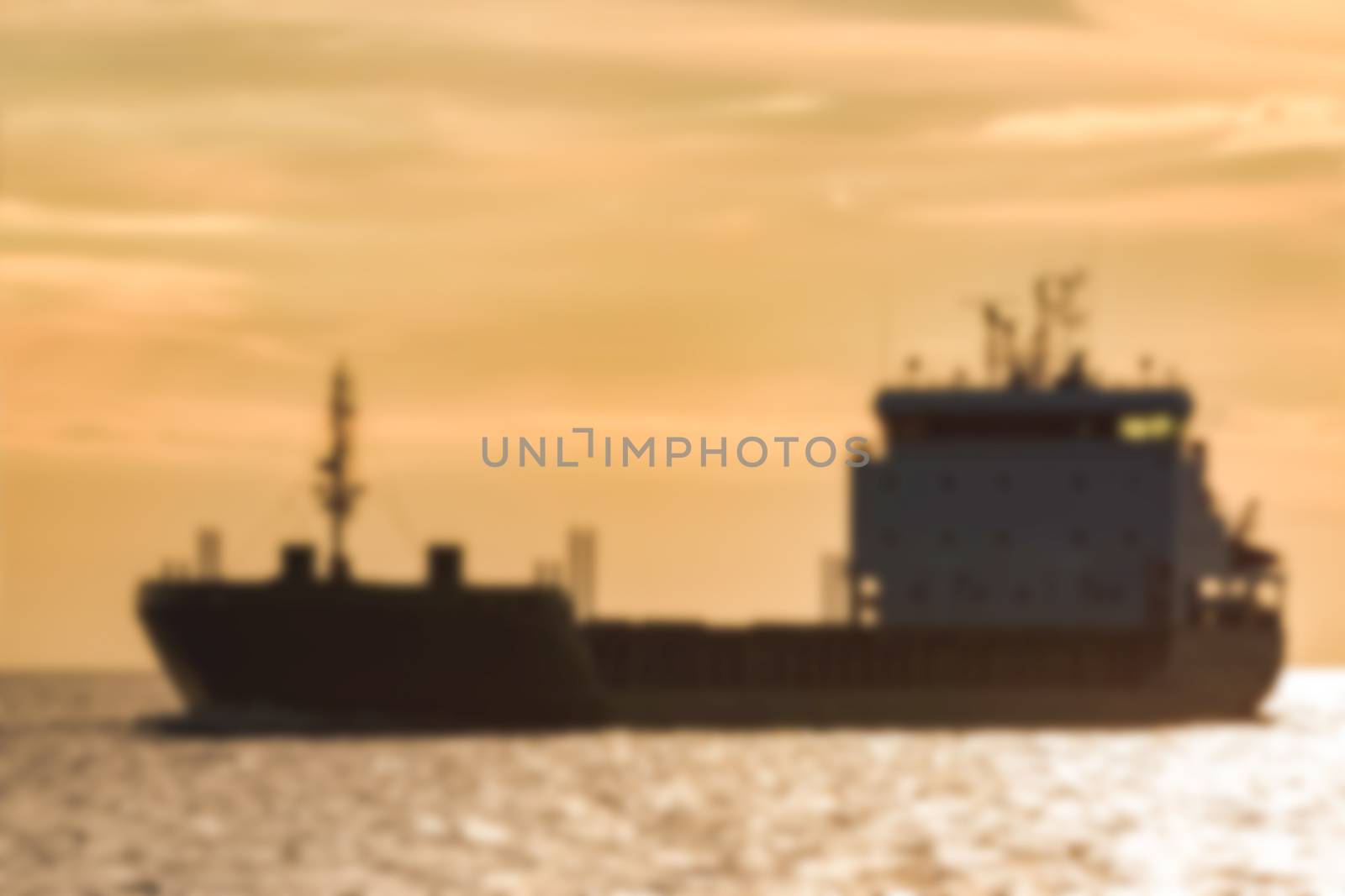 Cargo ship - blurred image by sengnsp