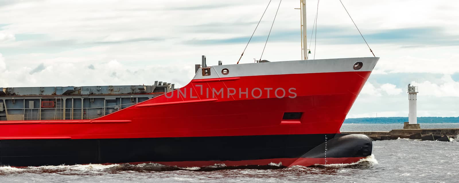 Red new cargo ship moving abroad. Product export in Europe