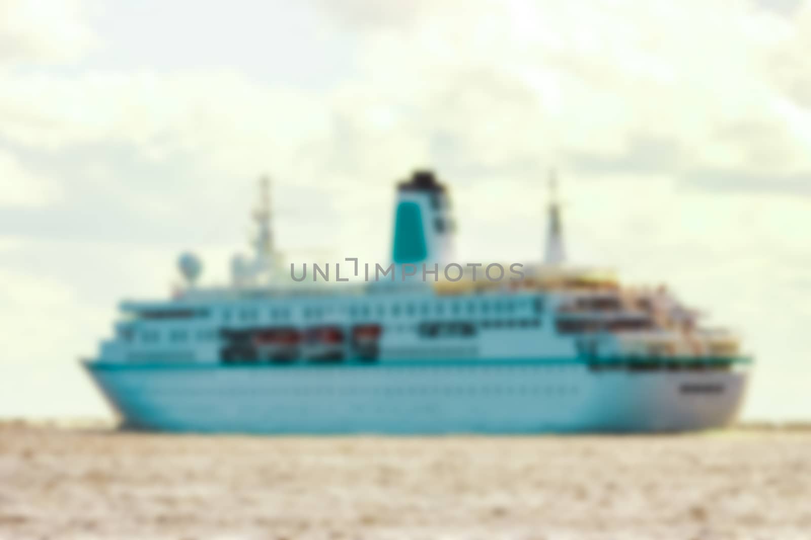 White cruise liner - blurred image by sengnsp