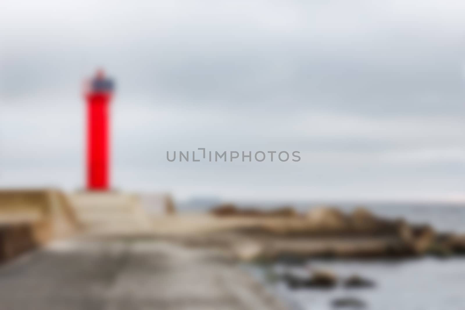 Red lighthouse - soft lens bokeh image. Defocused background