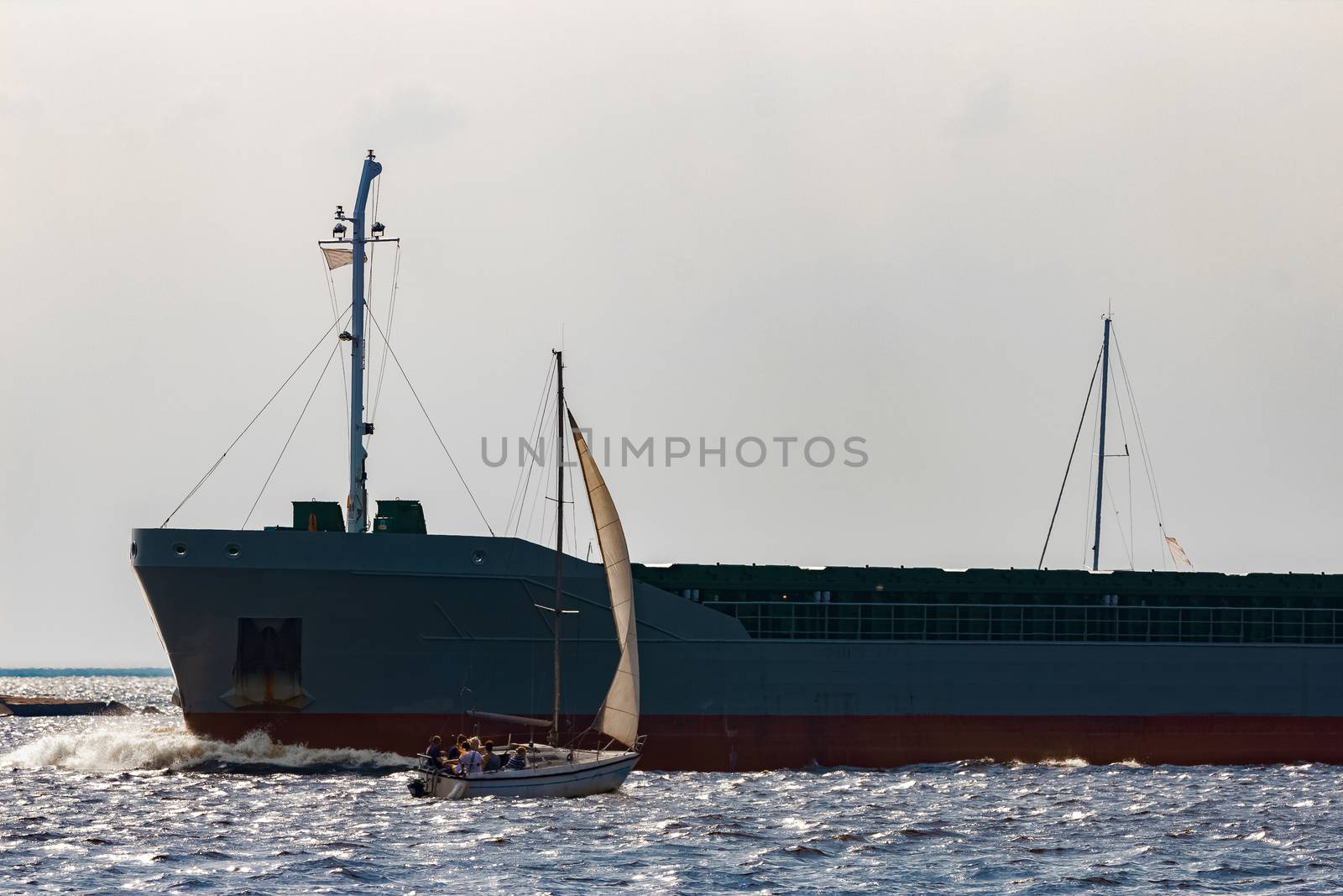 Grey bulker ship. Logistics and merchandise transportations