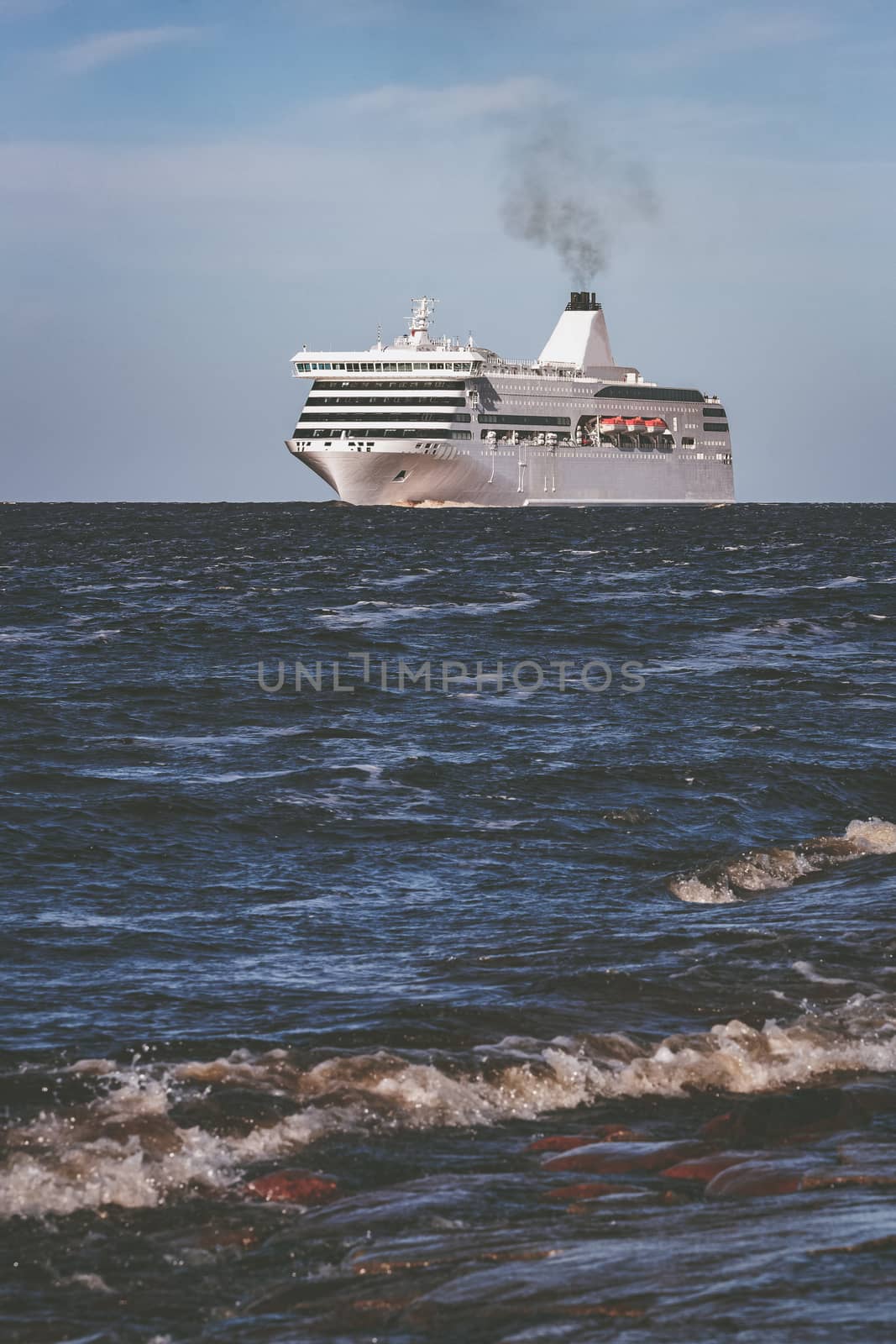 White cruise liner sailing on a clear day