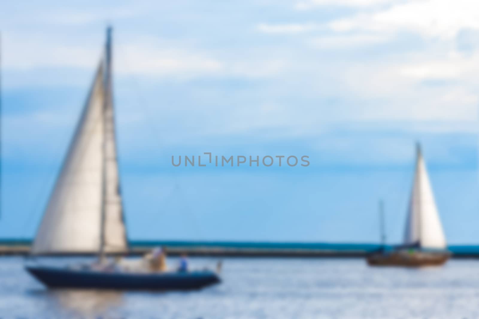 Blue sailboat - blurred image by sengnsp
