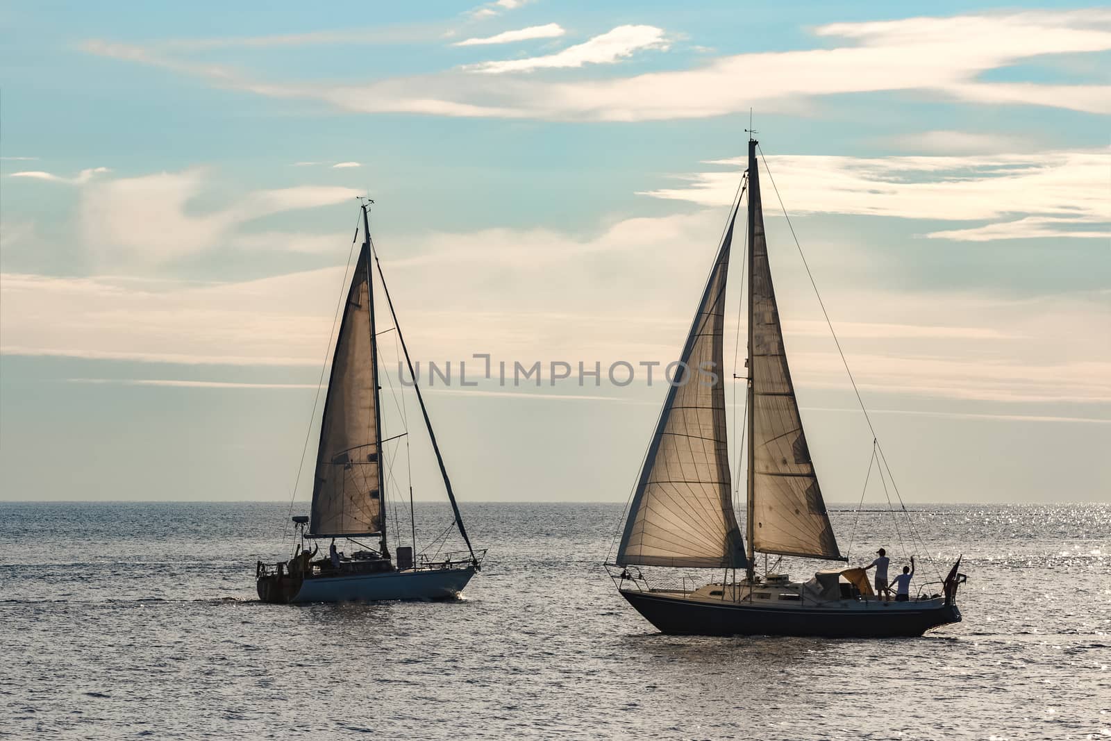 A fiew sailboats are traveling in Baltic sea. Summer journey