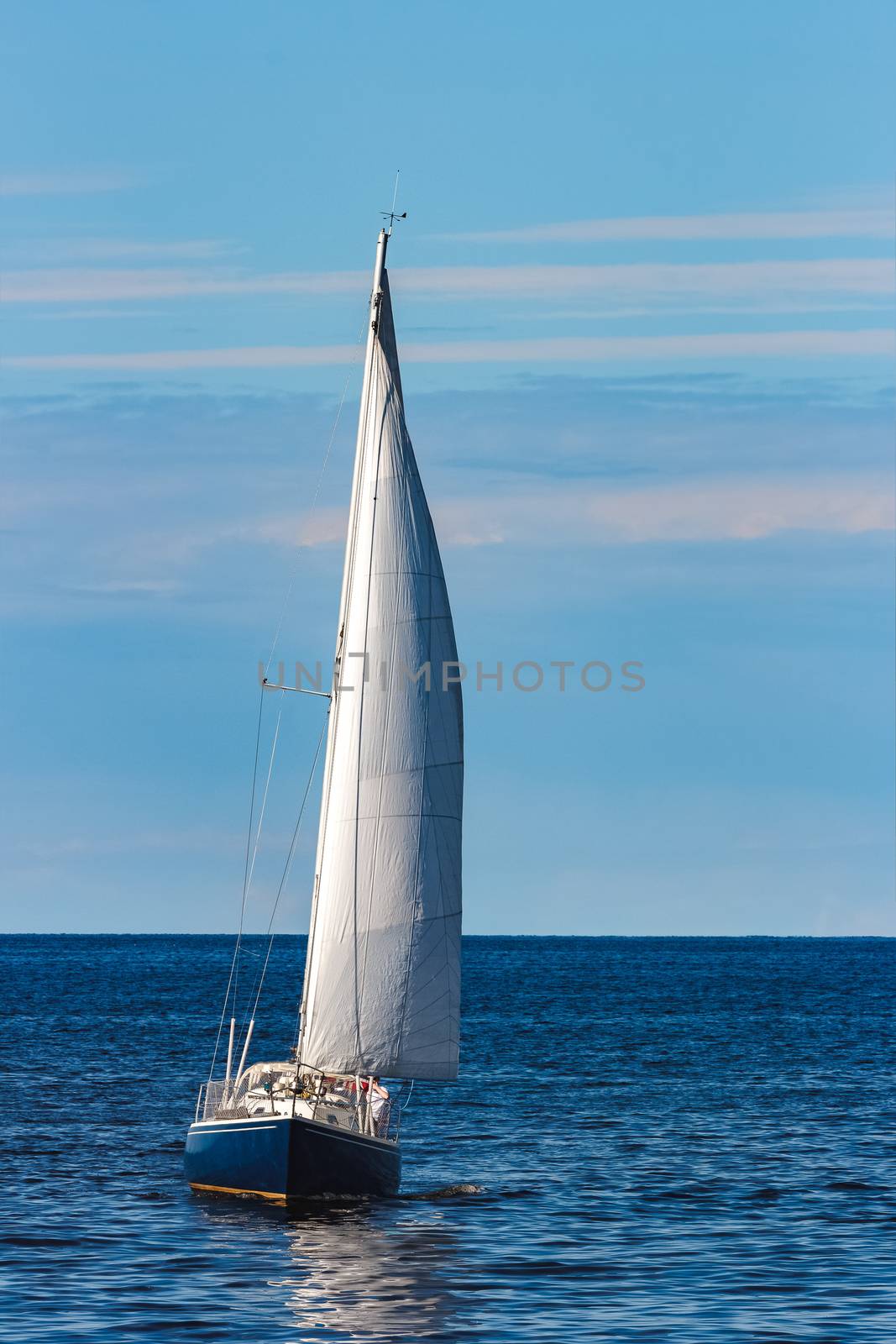 Blue sailboat at journey by sengnsp