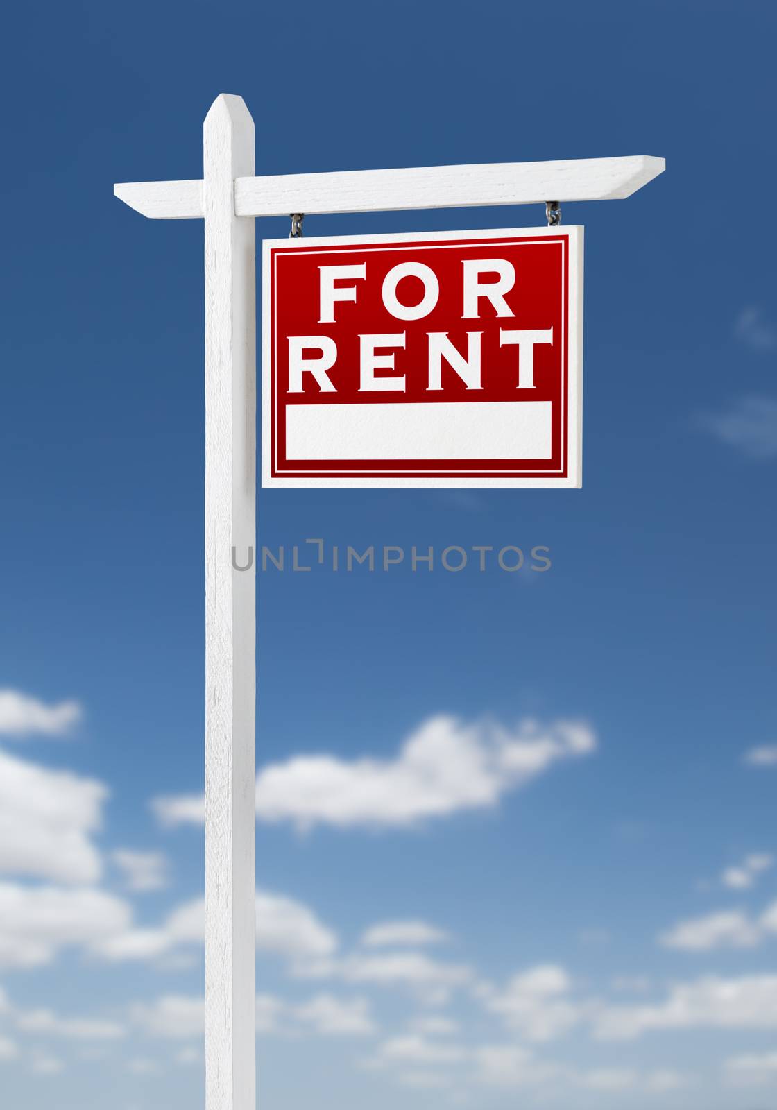 Right Facing For Rent Real Estate Sign on a Blue Sky with Clouds by Feverpitched