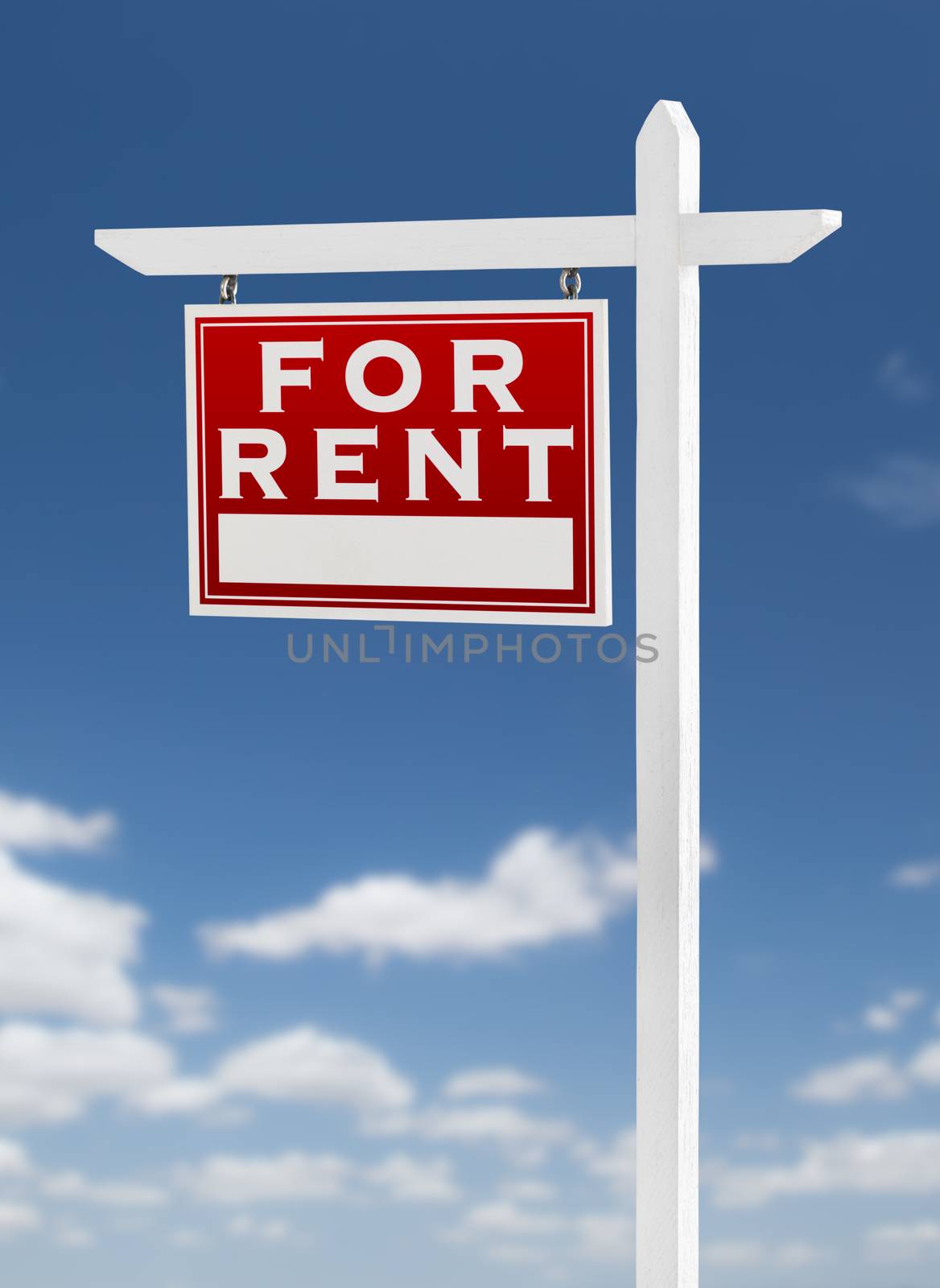 Left Facing For Rent Real Estate Sign on a Blue Sky with Clouds. by Feverpitched