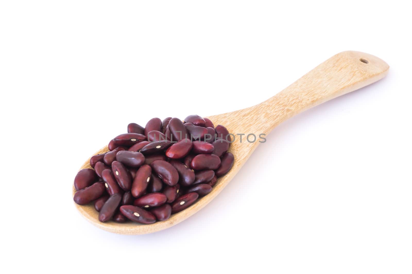 Closeup red beans in wood spoon on white background, healthy food concept