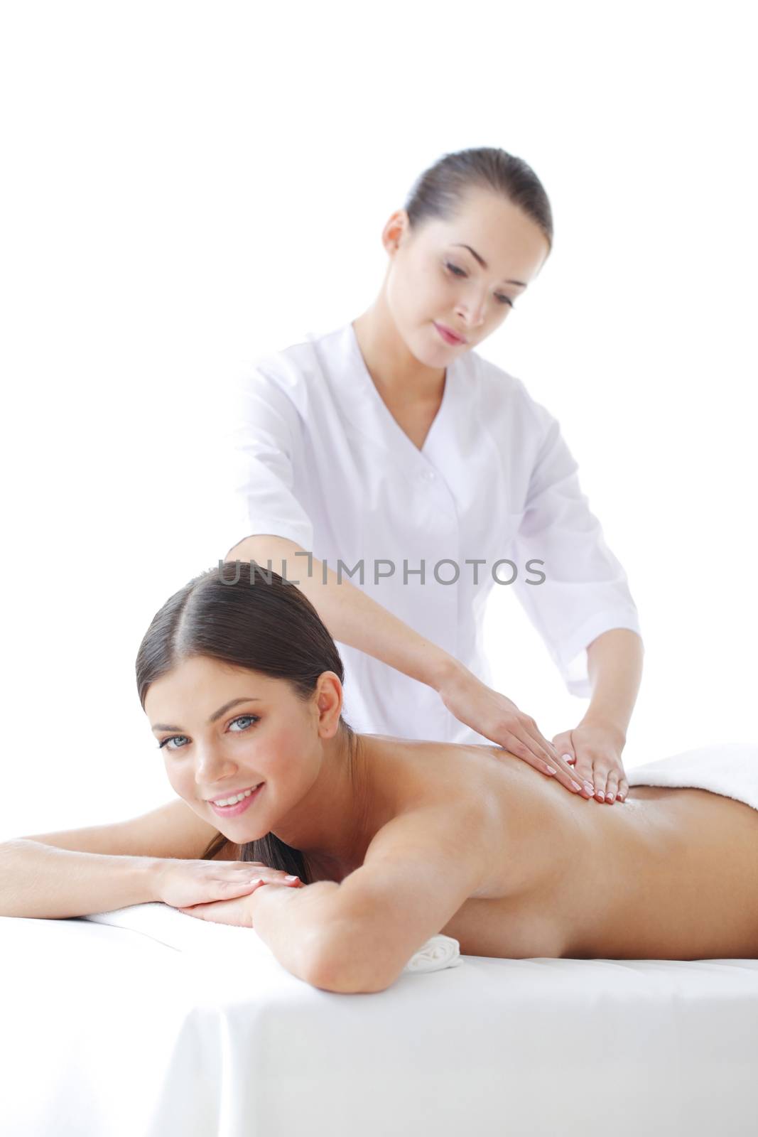 Woman getting massage by ALotOfPeople