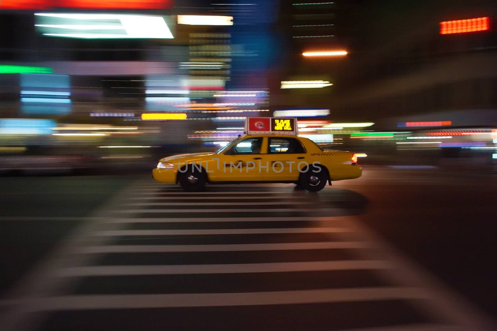 New-York taxi blazes through the night by totony