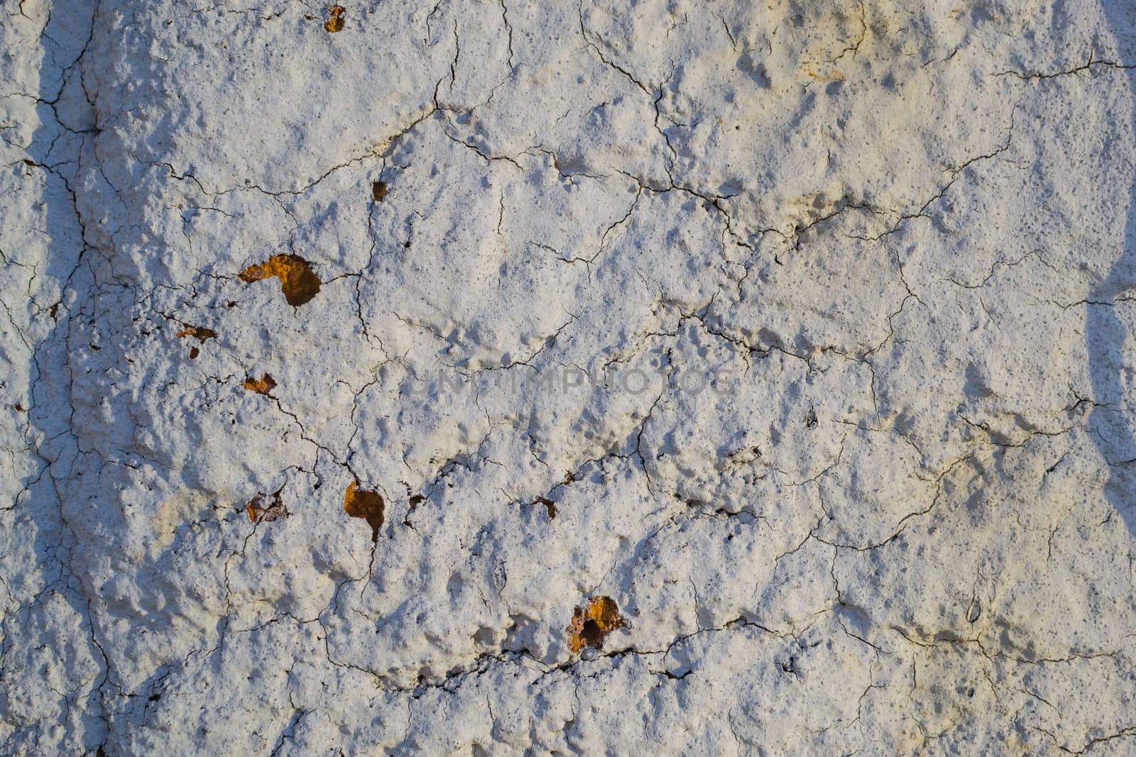 old plaster with red spots, old building texture plaster