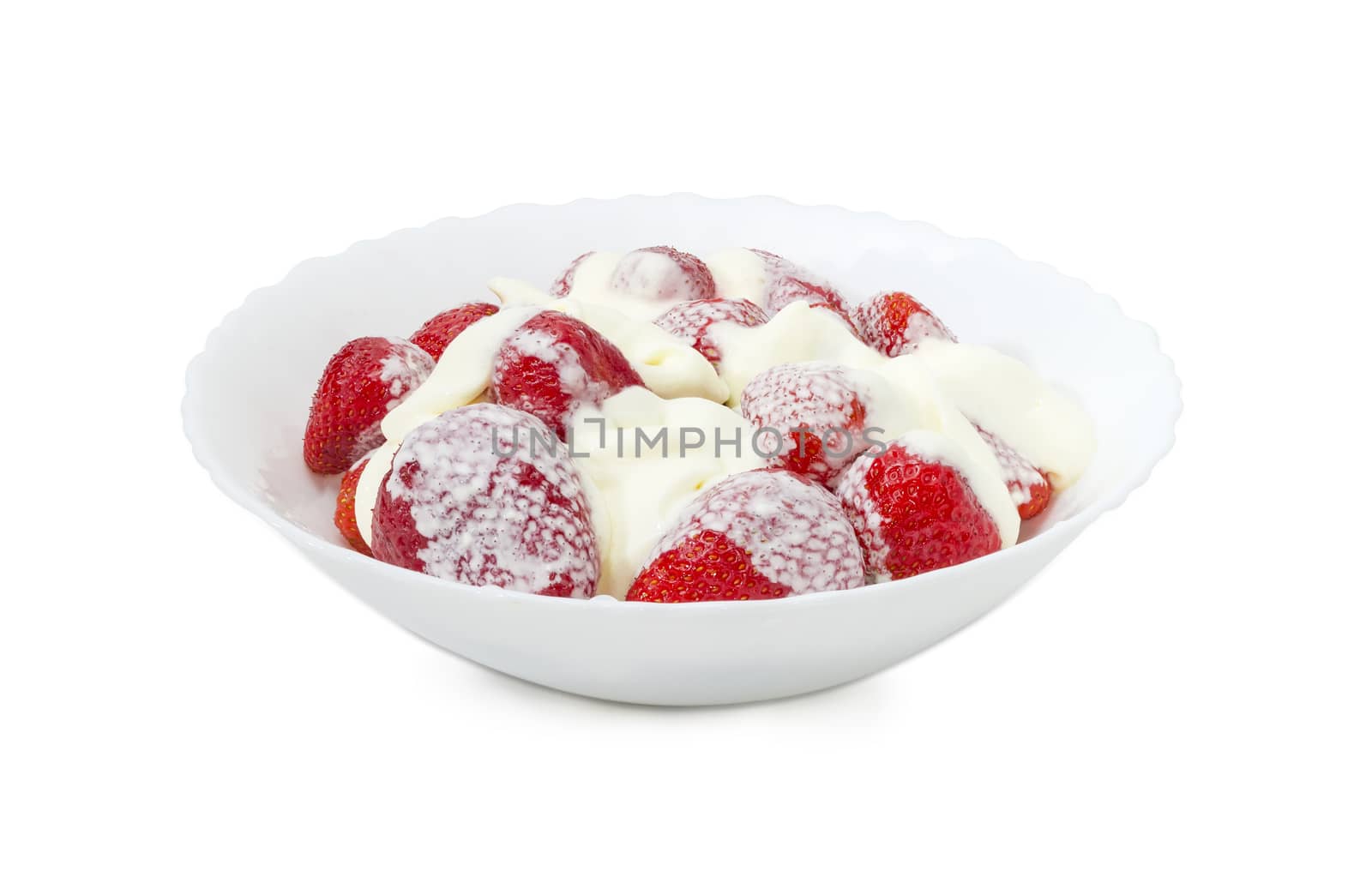 Strawberry dessert with whipped cream in white bowl on a light background
