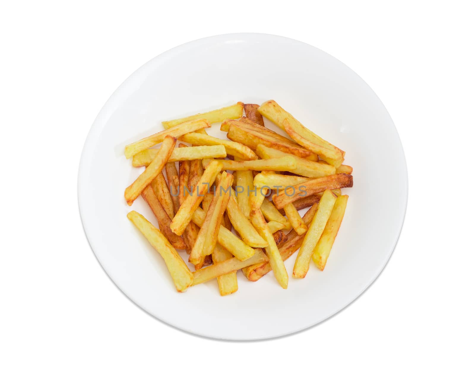 Top view of the serving of the French fries on the white dish on a light background
