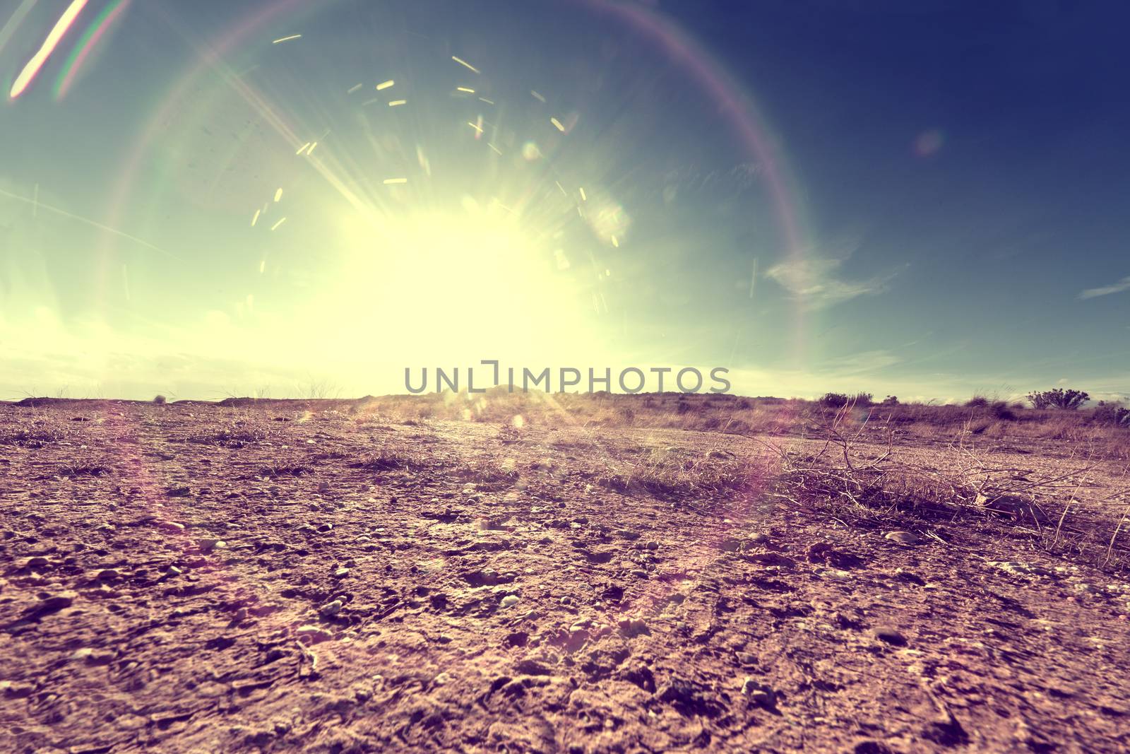 Outdoor soil floor background and sun in vintage style.