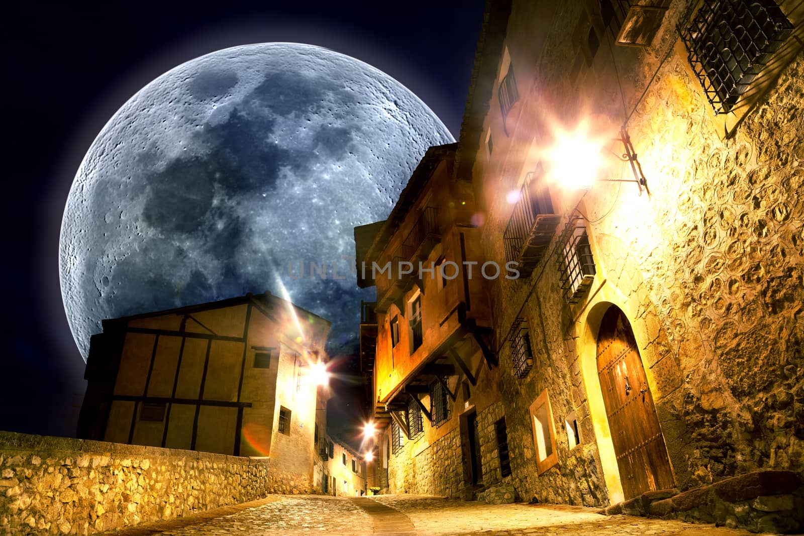 Dreamscape full moon cityscape and street and lamppost.