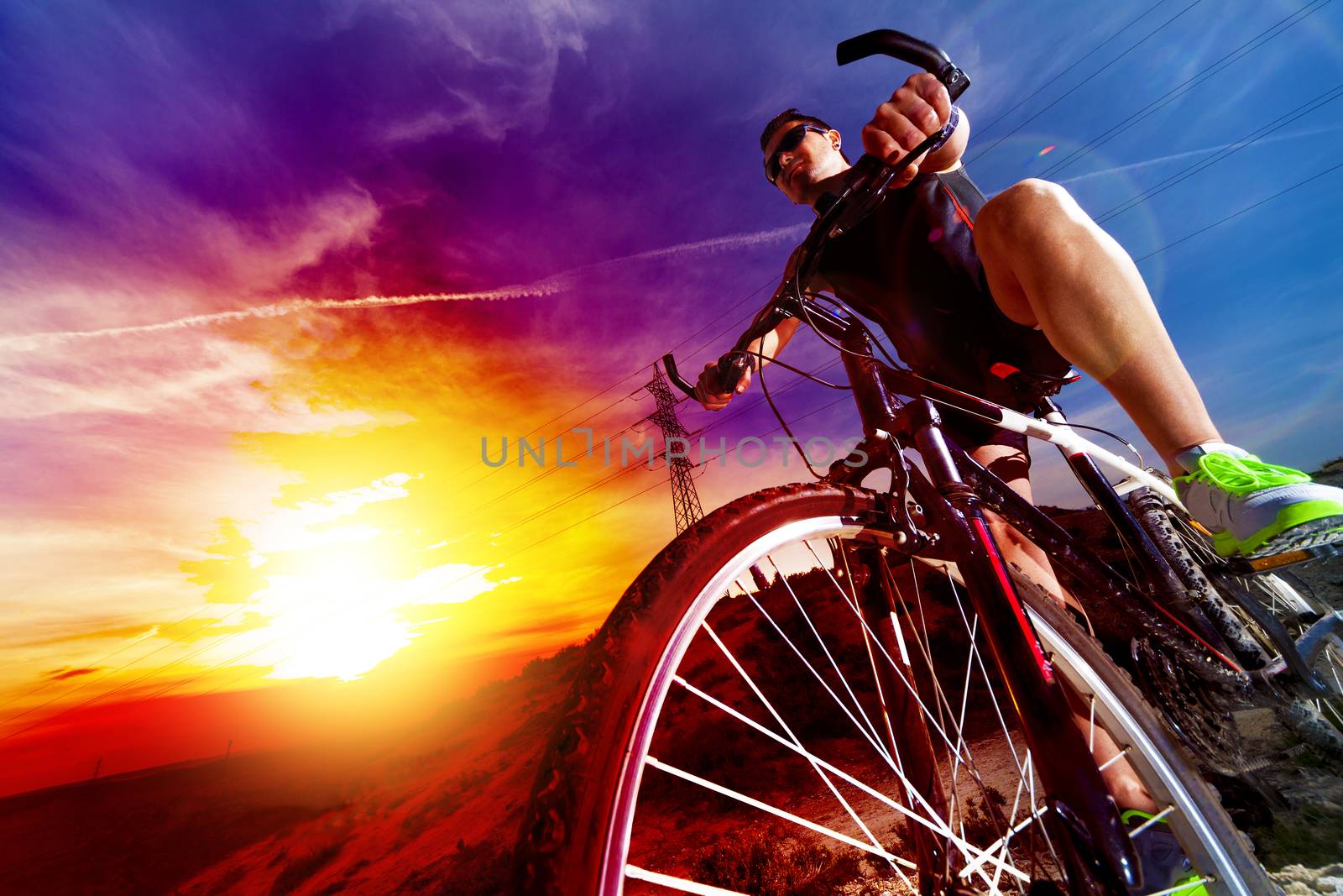 Sport and healthy life.Mountain bike and sunset.
