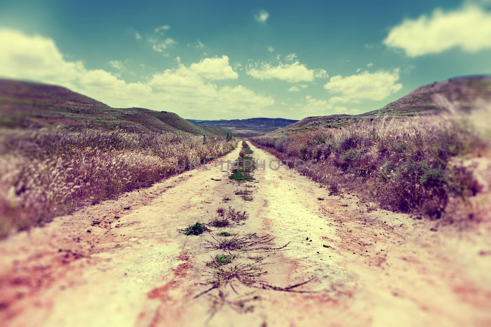 Empty road nature and ramble. Hills,blue sky.Walk around landscape