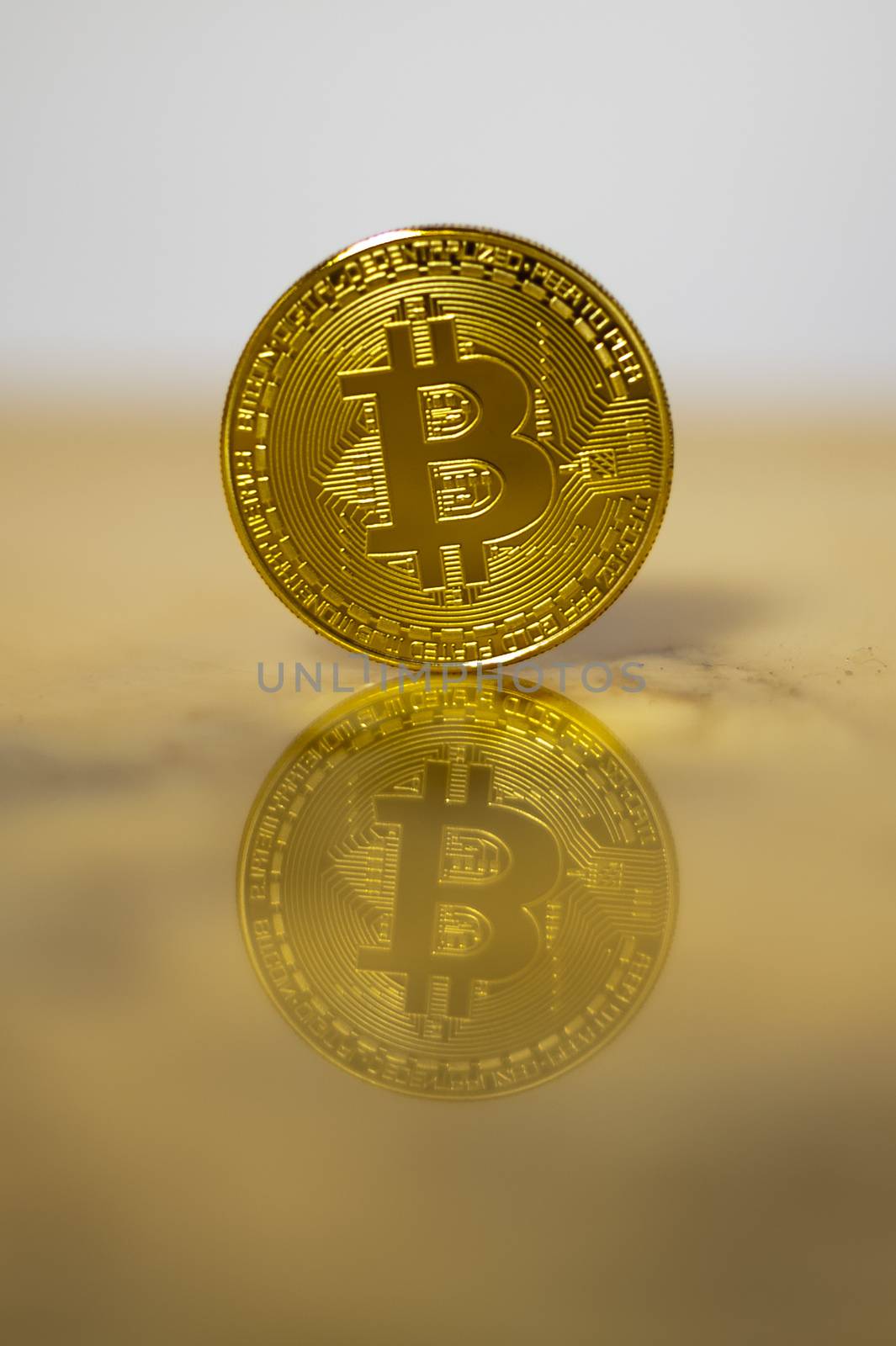 bitcoin on light marble electronic currency background