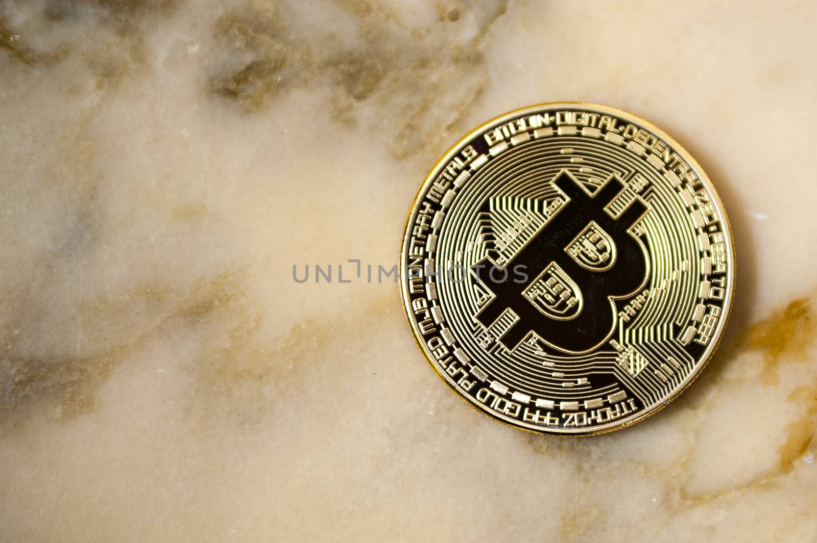 bitcoin on light marble electronic currency background