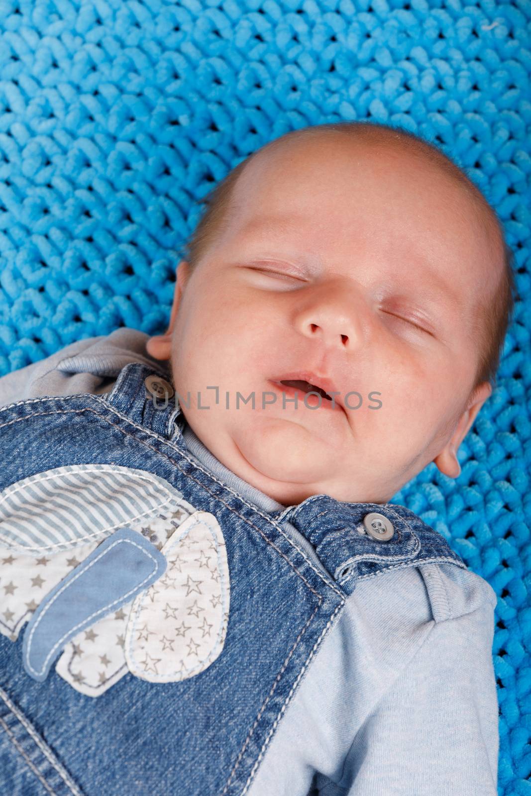 sleeping newborn baby - the first month of the new life